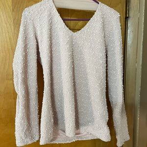 Jennifer Lopez, pink sparkly sweater